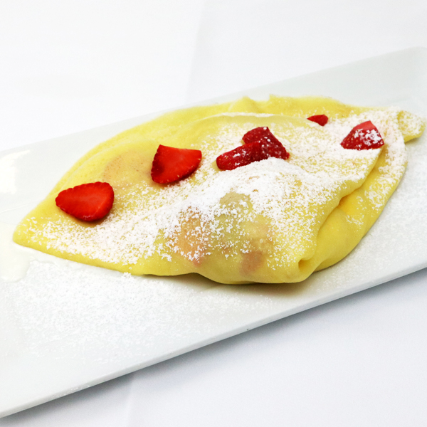 Crepes with yoghurt and strawberries